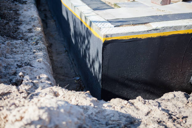 Professional Foundation Crack Repair technician working in South Vienna, OH